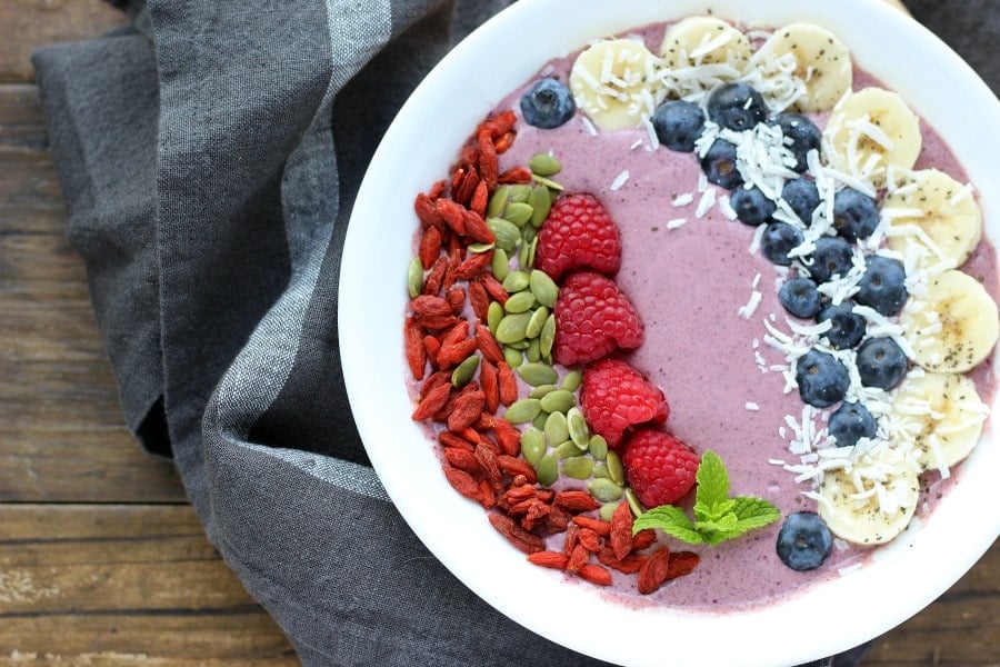 This nutrient dense Acai Berry Smoothie bowl makes for a great breakfast or lunch substitute. gardneinthekitchen.com