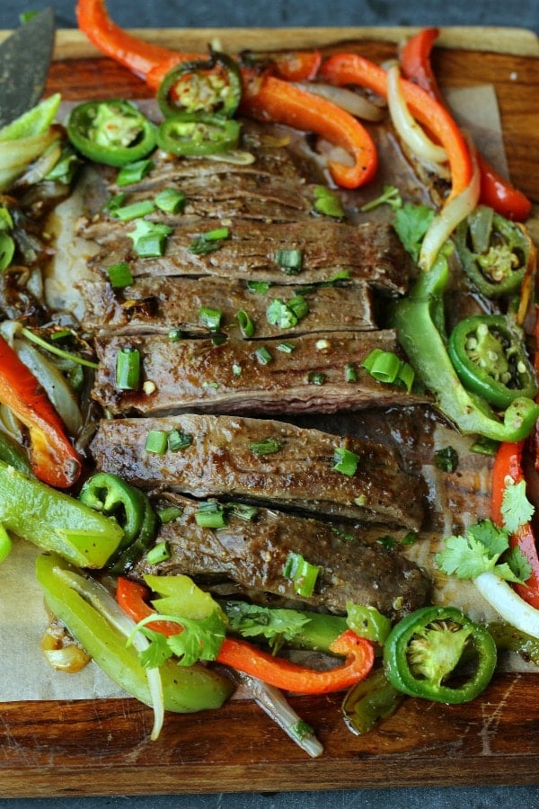 The BEST Steak Fajitas you will ever eat! Juicy, tender, spicy and flavored to perfection | gardeninthekitchen.com