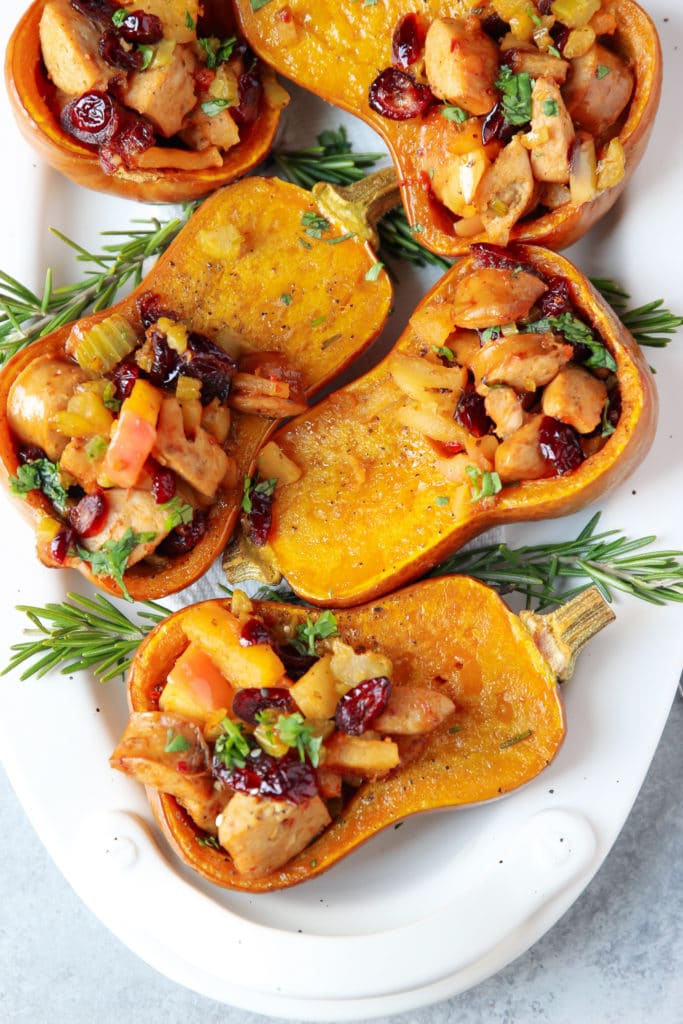 Squash sliced in half, roasted and stuff with apple, sausage and other ingredients and herbs