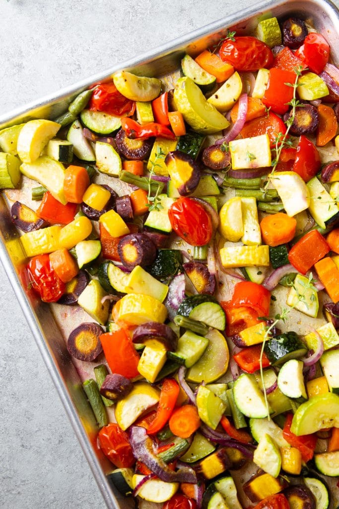 roasted vegetables in a sheet pan