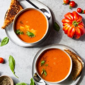 easy instant pot tomato soup in white small bowls