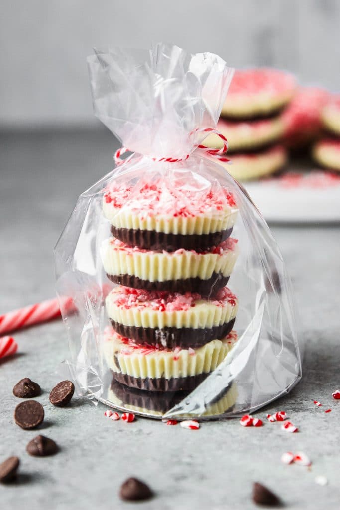 chocolate peppermint cups stacked on top of each other and wrapped in cellophane for gifts.
