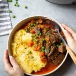 Beef Stew with Carrots Peas and Creamy Polenta