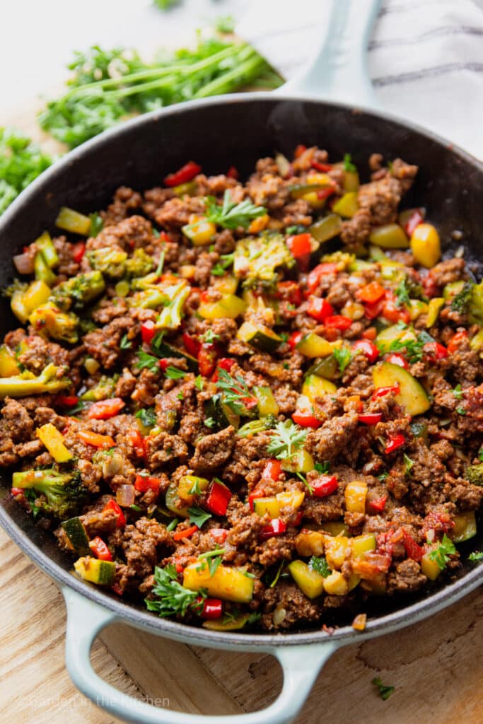 Ground beef skillet with low carb vegetables in cast iron skillet.