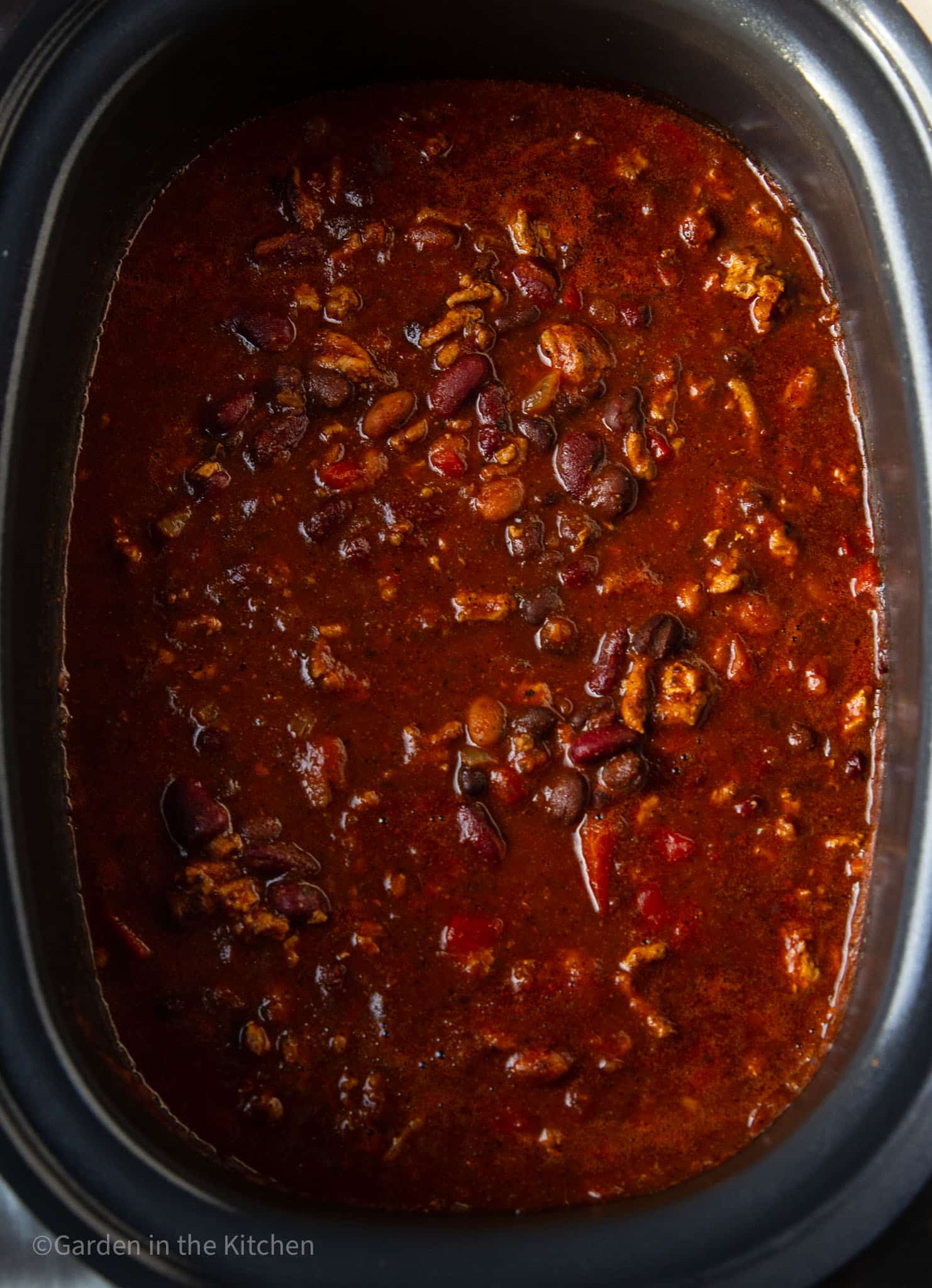 Slow cooker turkey chili ready to cook.