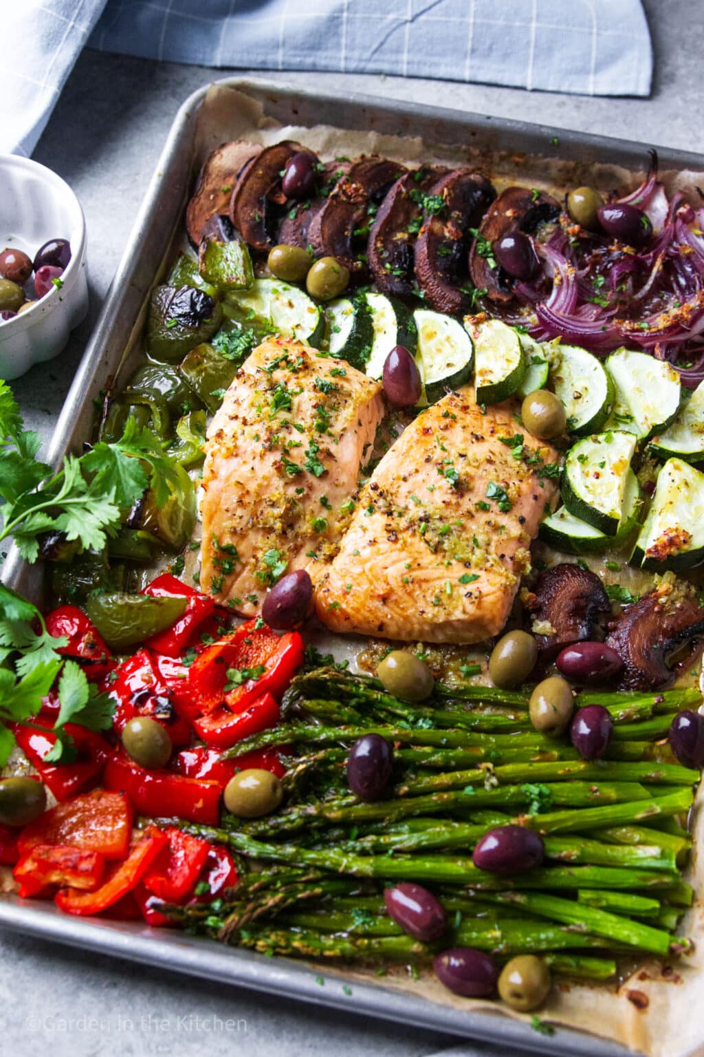 A variety of sheet pan recipes featuring chicken and vegetables, salmon, and healthy one pan meals with vibrant colors and fresh ingredients.