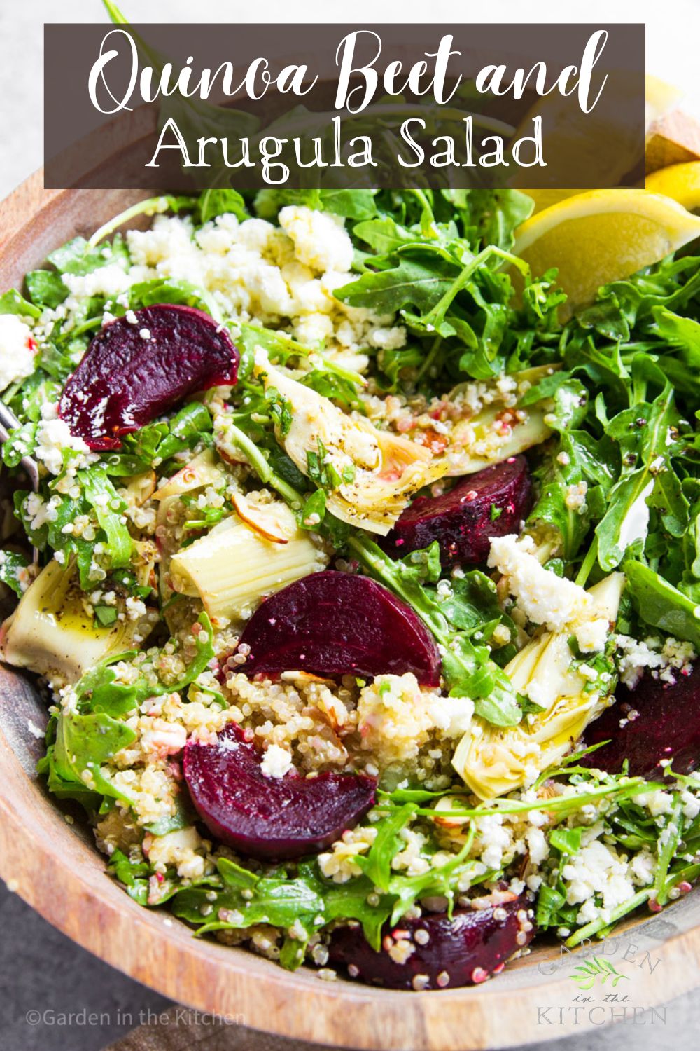 Quinoa salad with beets, arugula and feta cheese, served in a round wooden bowl. 