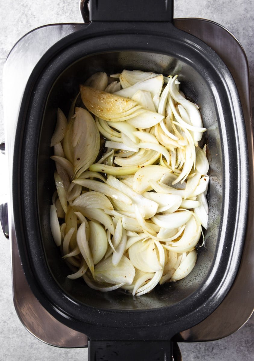 Raw onions in a crockpot