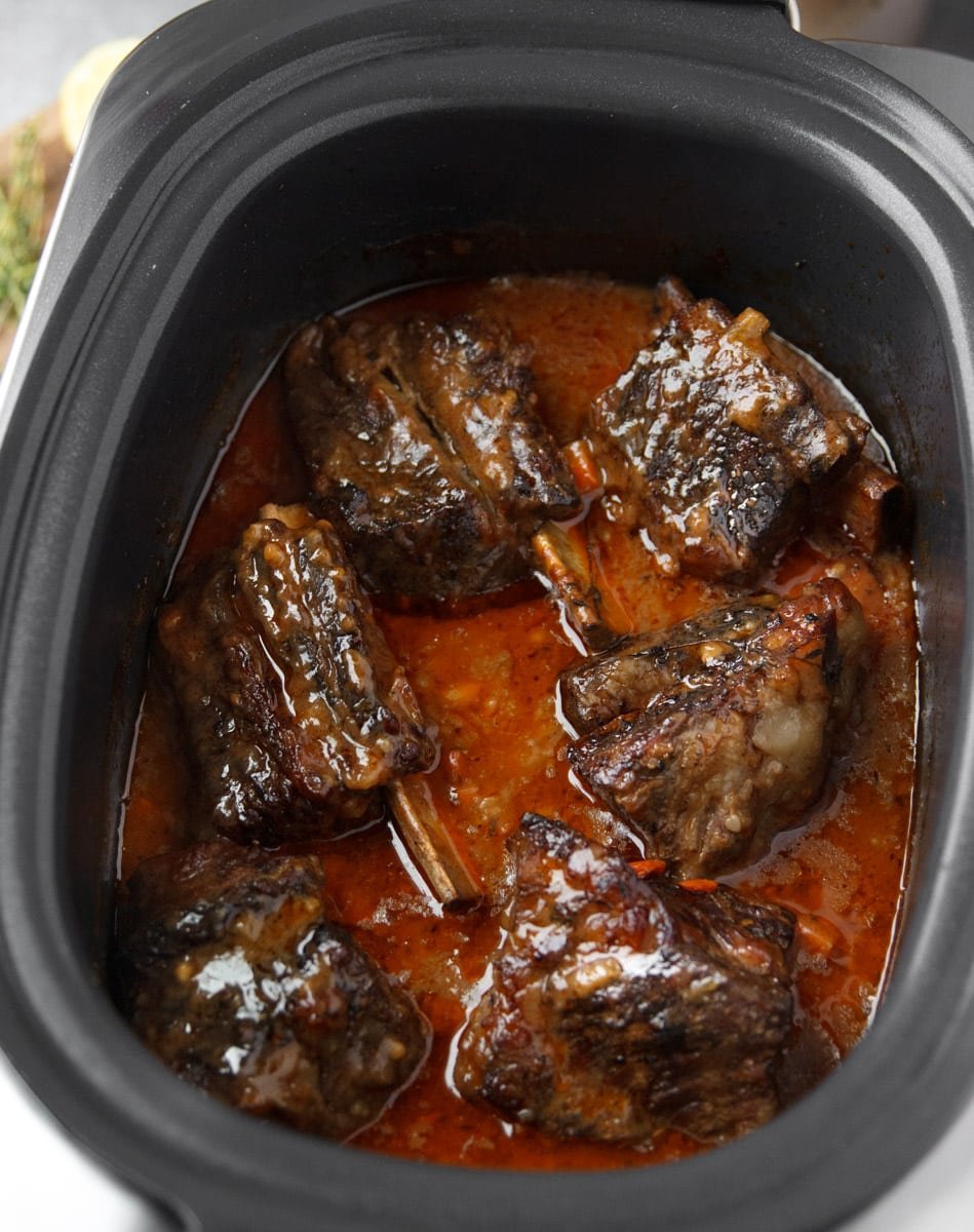 Slow cooker beef ribs in a crockpot. 