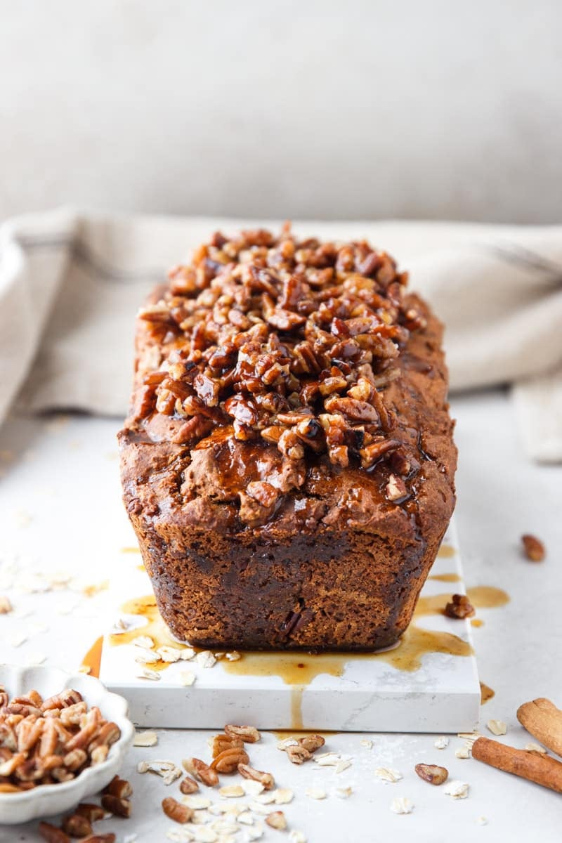 Maple pecan sweet potato bread., pecans, cinnamon sticks, and oats. 