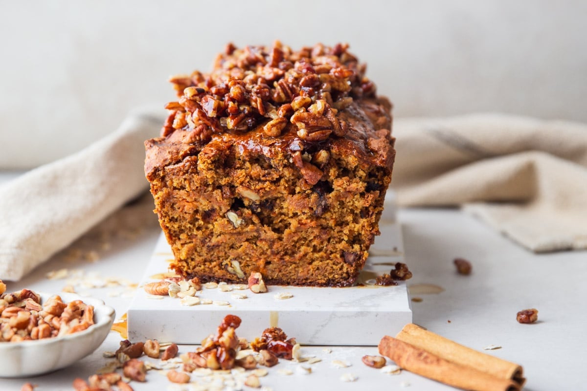 Maple pecan sweet potato bread., pecans, cinnamon sticks, and oats. 