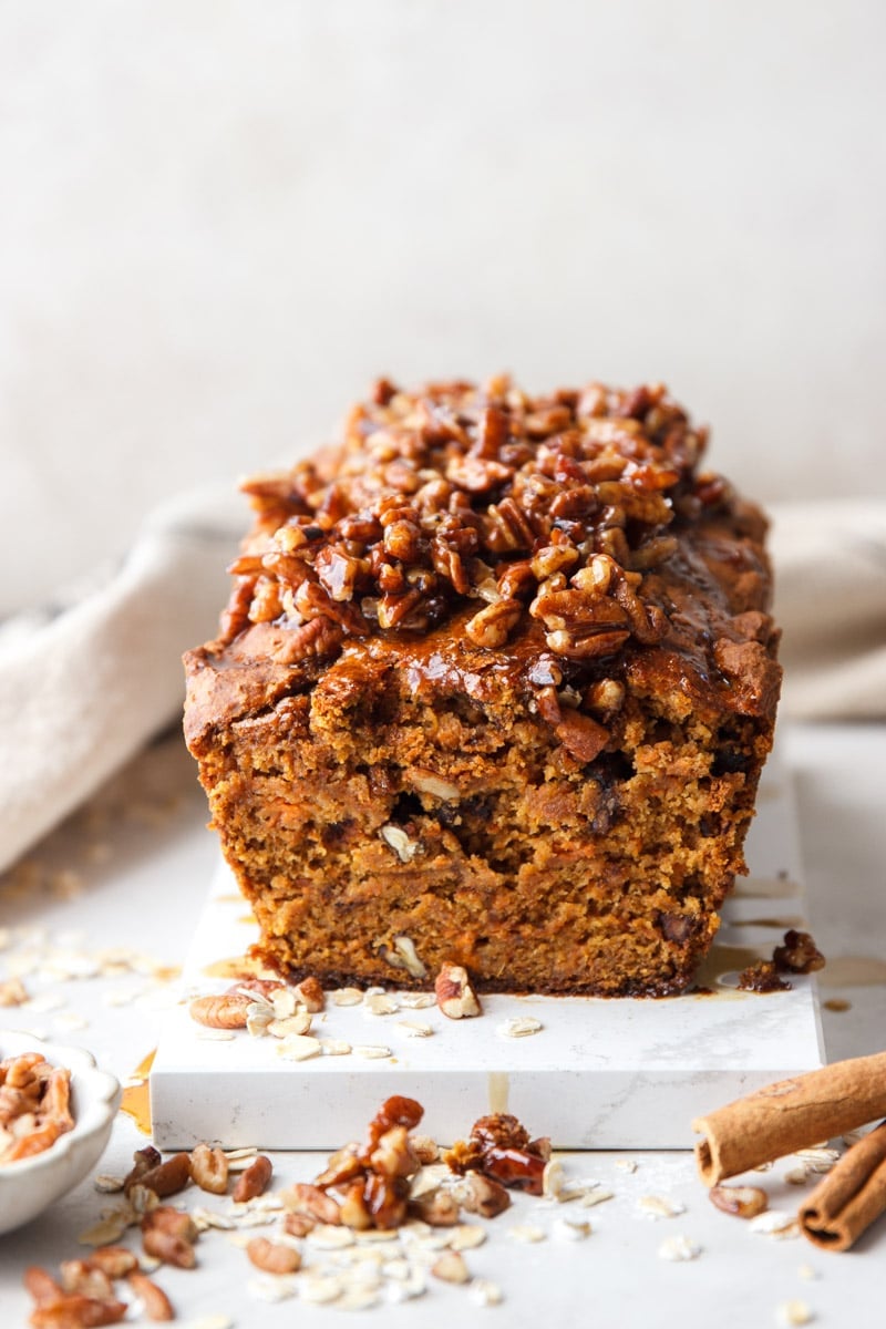 Maple pecan sweet potato bread., pecans, cinnamon sticks, and oats. 