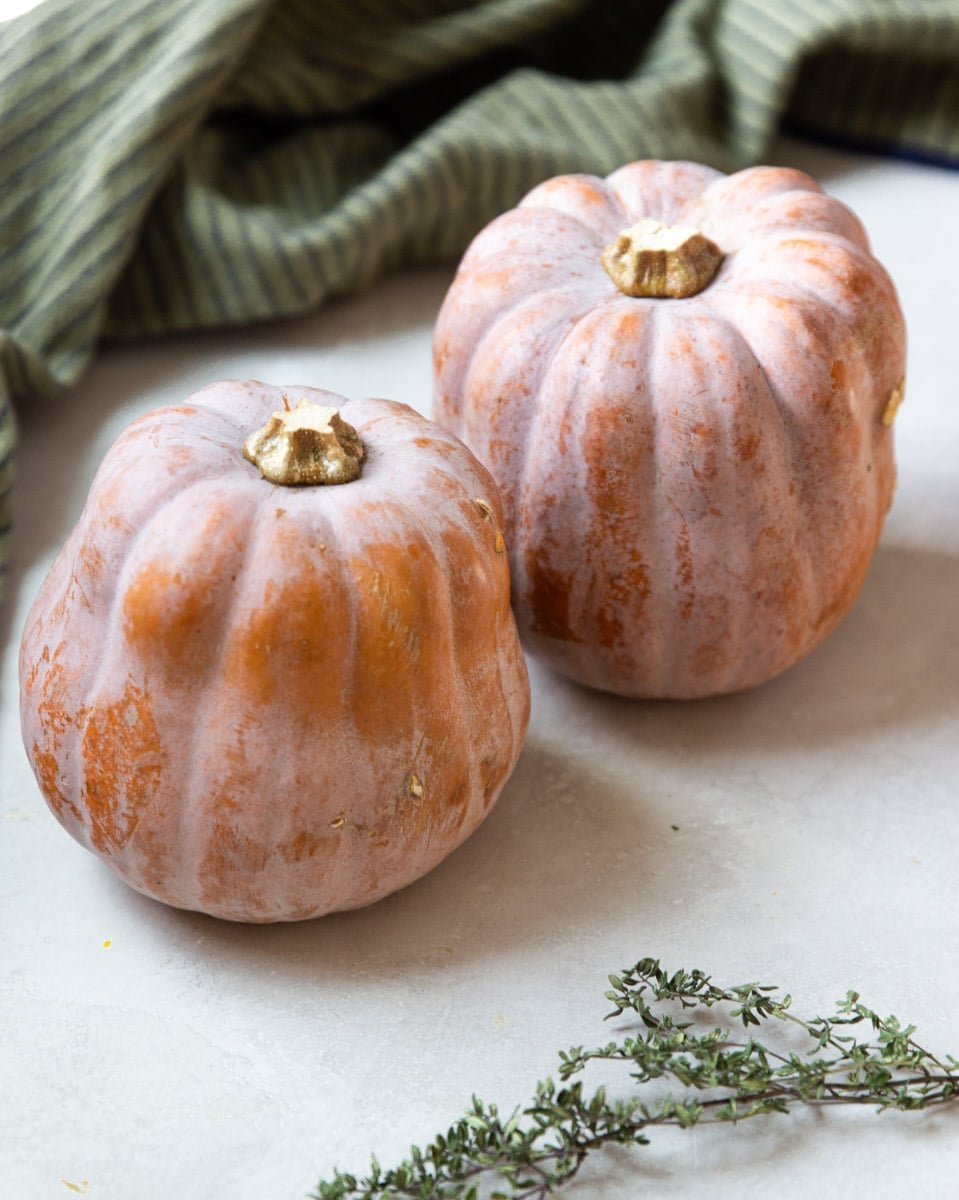 Koginut squash, striped dish towel, and fresh thyme. 