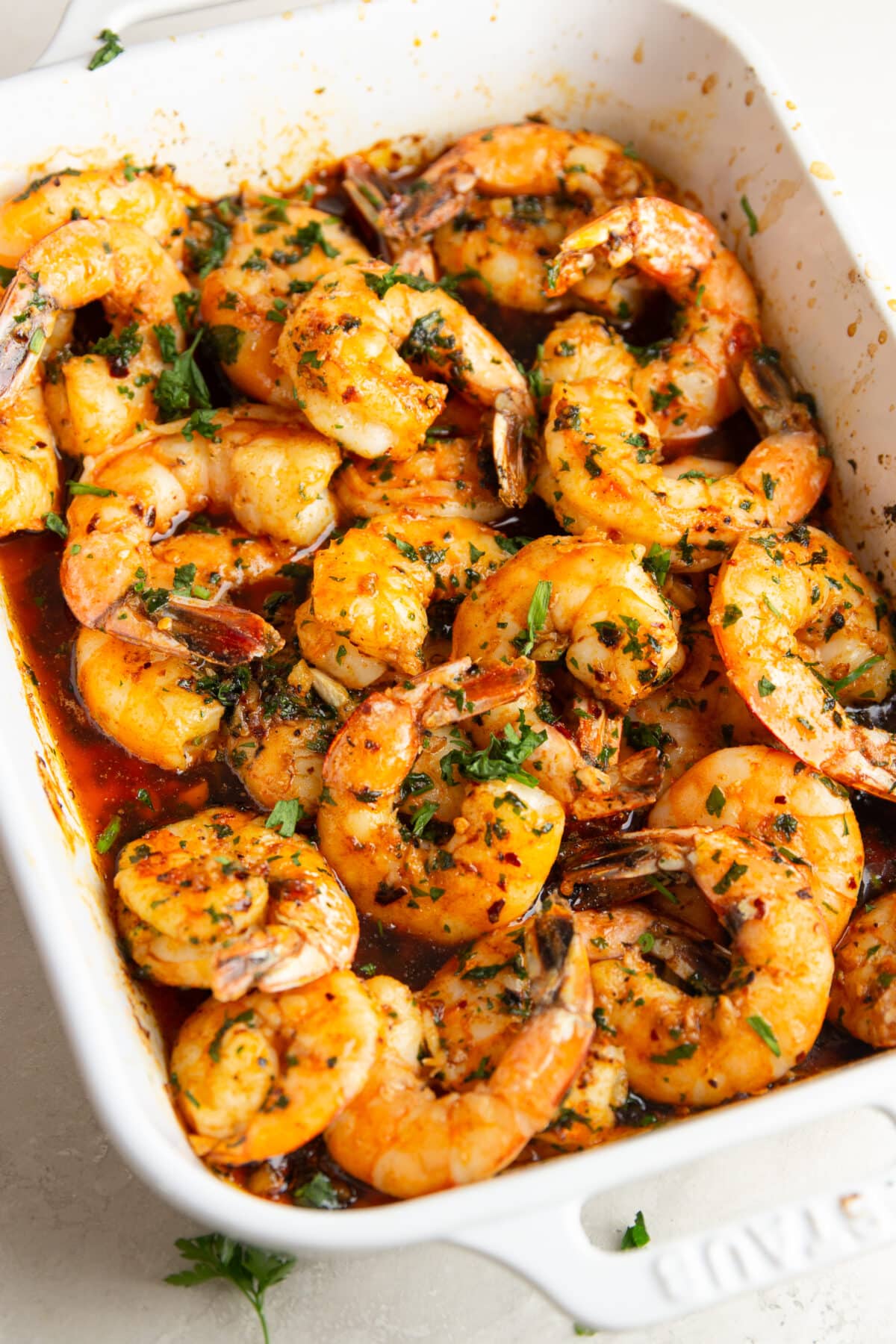 sheet pan garlic butter prawns roasted with tomatoes and asparagus