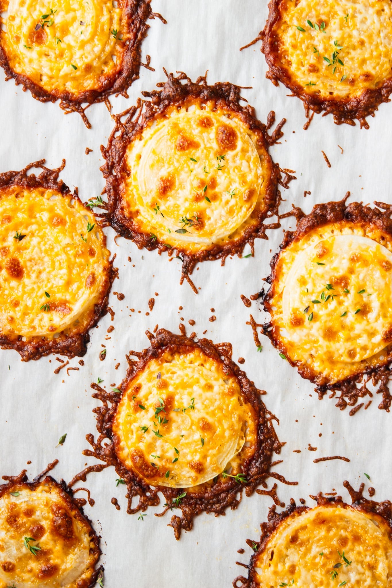 Make these crispy Cheesy Onion Crisps with just two simple ingredients! Golden, cheesy, and irresistibly crunchy, they're perfect as an appetizer, snack, or low-carb side dish.