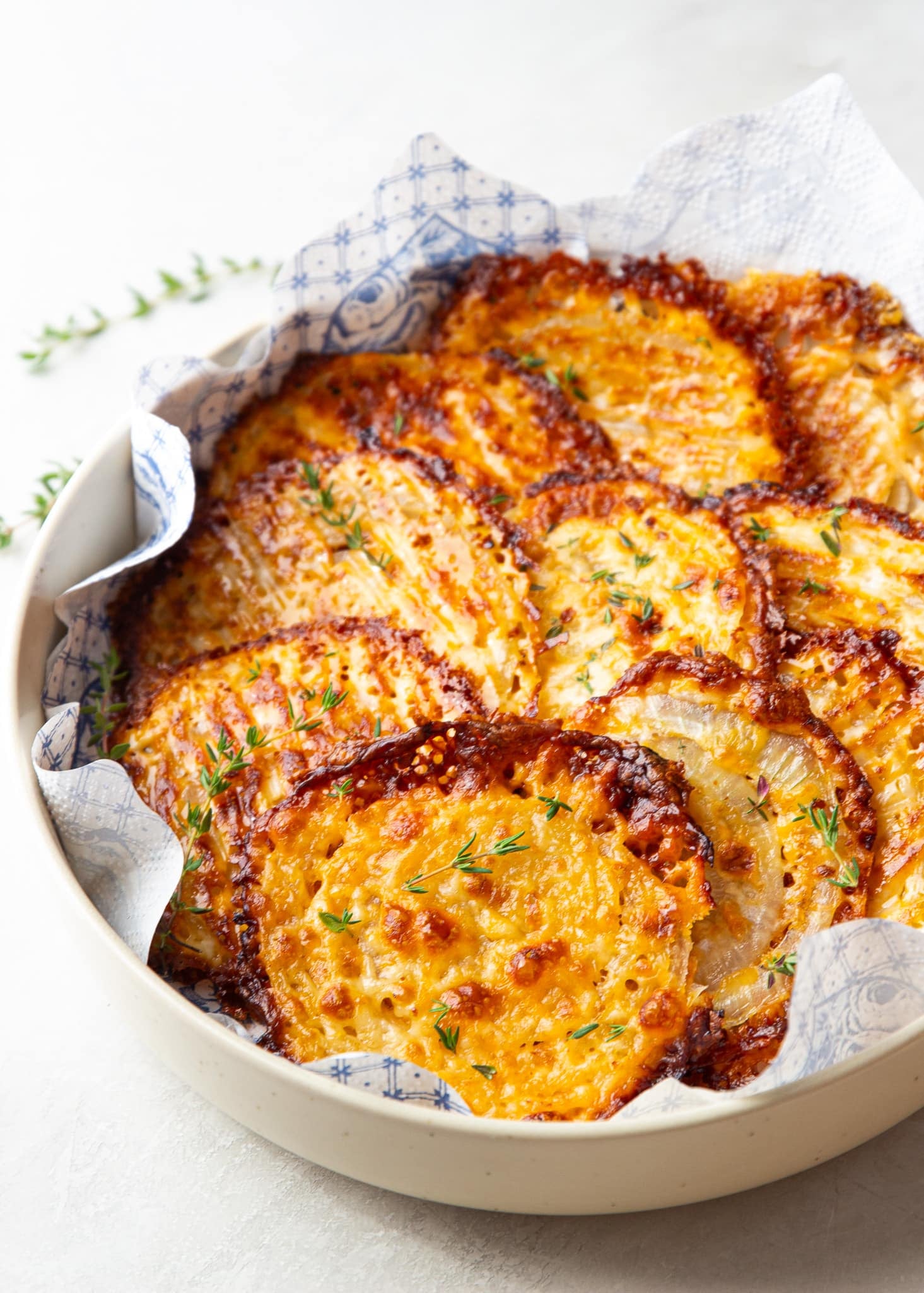 Make these crispy Cheesy Onion Crisps with just two simple ingredients! Golden, cheesy, and irresistibly crunchy, they're perfect as an appetizer, snack, or low-carb side dish.