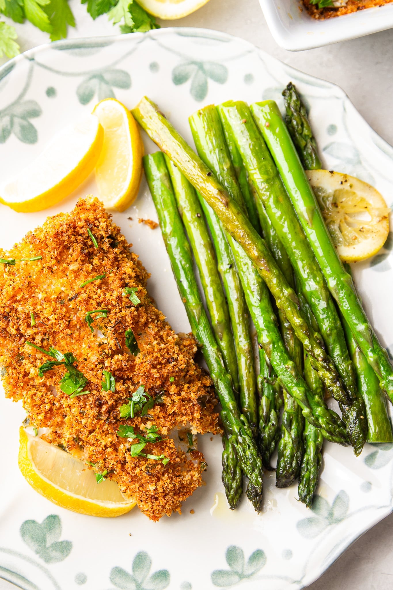 This Garlic Butter Parmesan Crusted Haddock is baked with buttery garlic, crispy Parmesan panko, and fresh herbs for an easy weeknight seafood dinner.