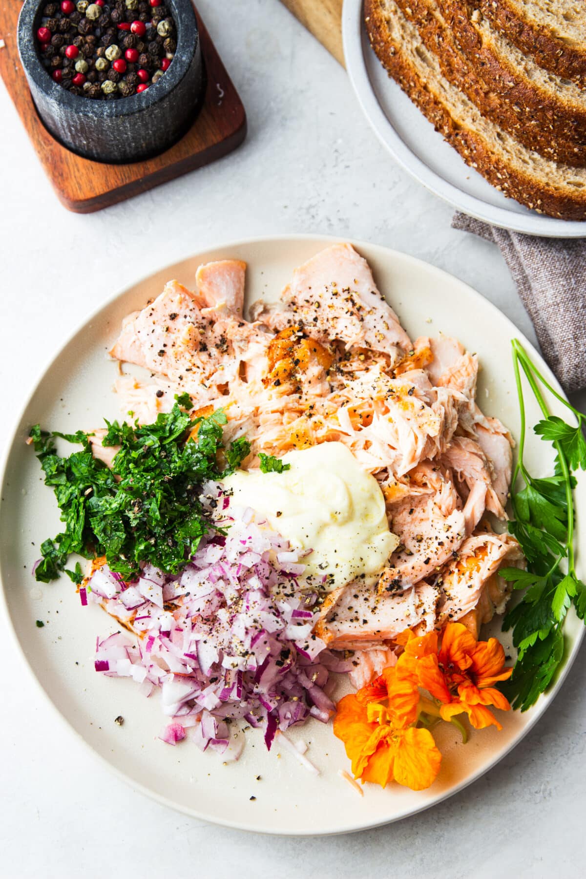 Turn leftover salmon into the best salmon salad sandwich! This easy, protein-packed lunch is made with flaky salmon, fresh herbs, lemon, and mayo in just 10 minutes.
