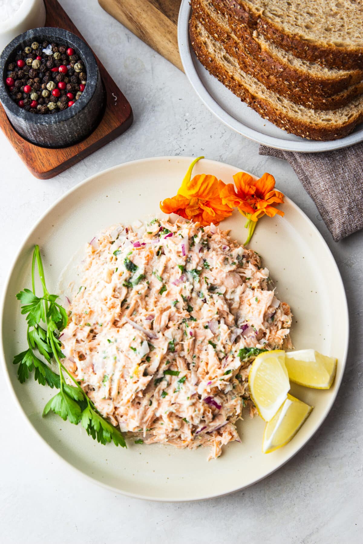Turn leftover salmon into the best salmon salad sandwich! This easy, protein-packed lunch is made with flaky salmon, fresh herbs, lemon, and mayo in just 10 minutes.