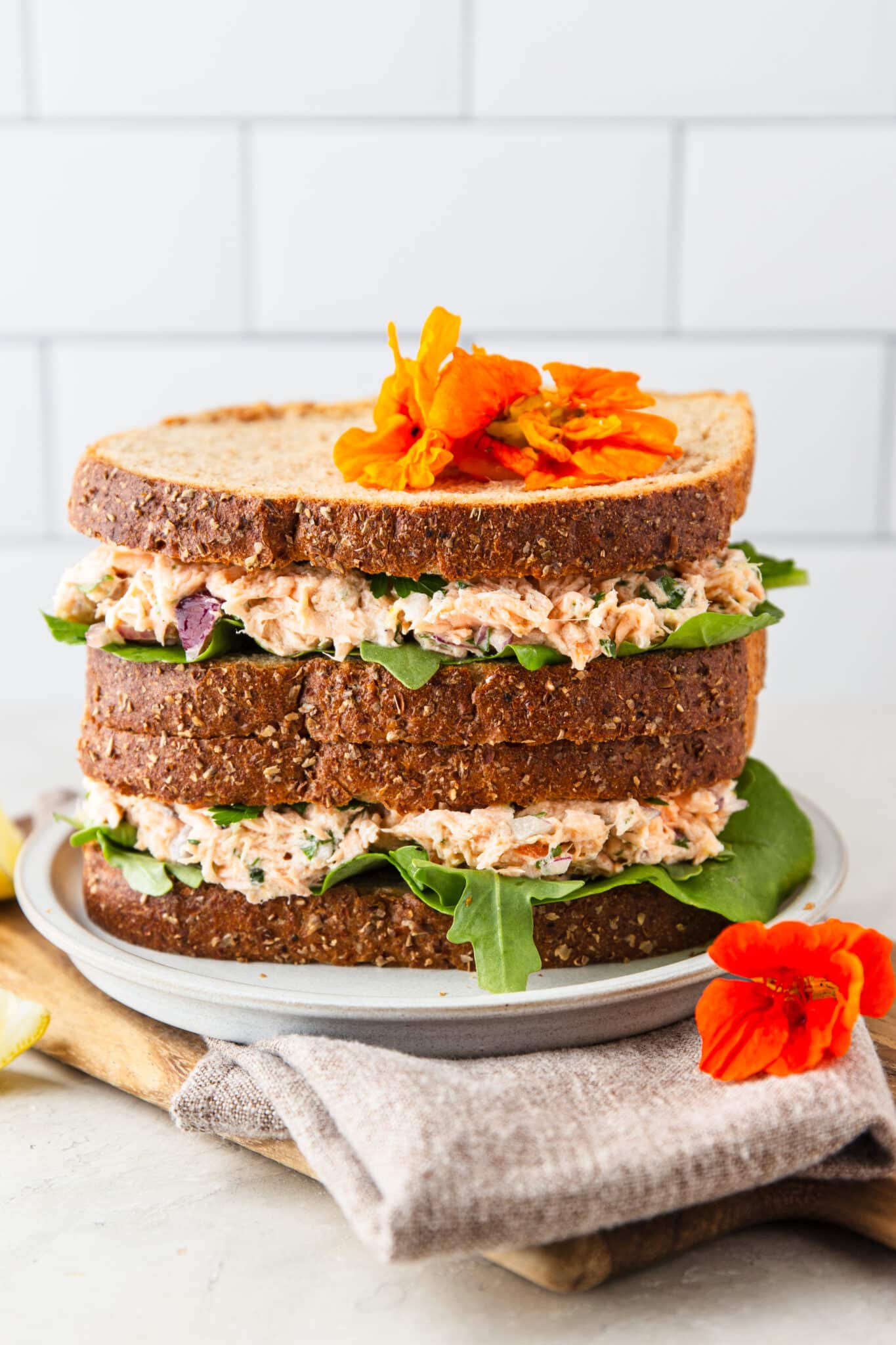 Turn leftover salmon into the best salmon salad sandwich! This easy, protein-packed lunch is made with flaky salmon, fresh herbs, lemon, and mayo in just 10 minutes.