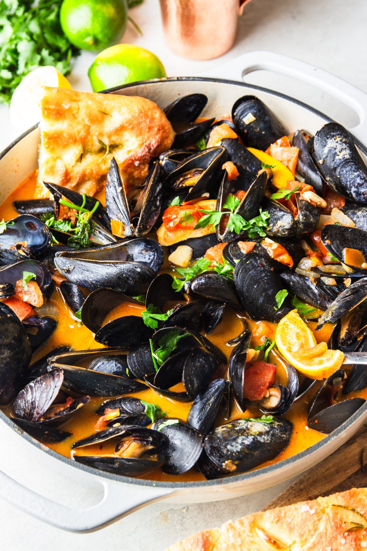 These Brazilian-inspired mussels are simmered in a rich tomato coconut broth with garlic, saffron, and fresh herbs. An easy one-pot seafood dinner perfect with crusty bread.