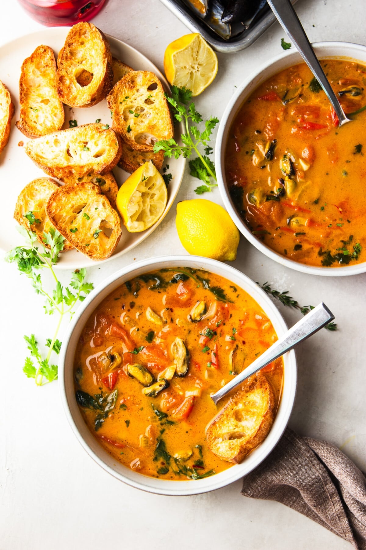 These Brazilian-inspired mussels are simmered in a rich tomato coconut broth with garlic, saffron, and fresh herbs. An easy one-pot seafood dinner perfect with crusty bread.