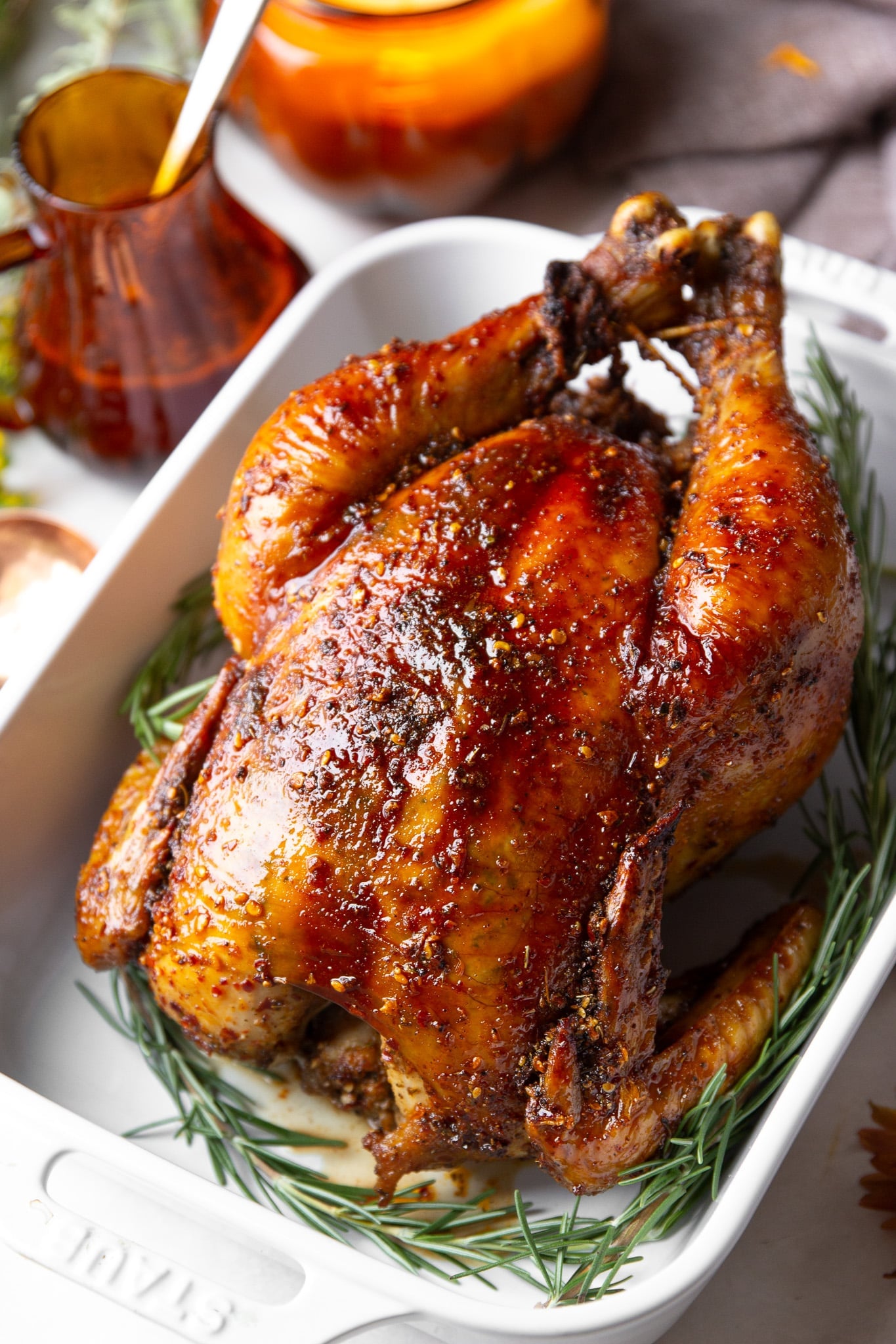 Hot honey roasted chicken with crispy golden skin and a sticky chili crunch glaze. Sweet, spicy, savory and packed with flavor.