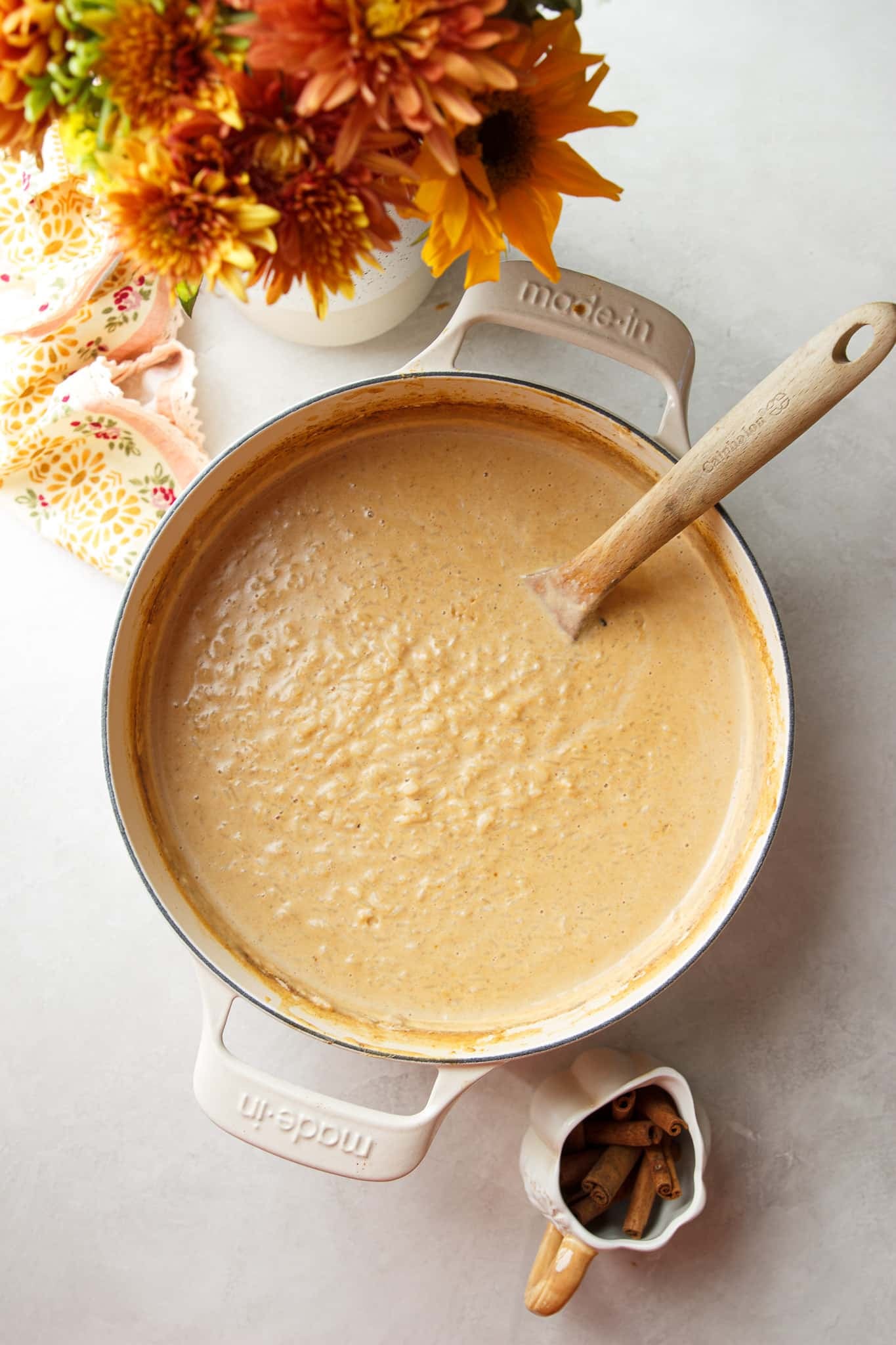 Creamy pumpkin rice pudding inspired by Brazilian arroz doce, made with condensed, evaporated and whole milk plus cinnamon and warm fall spices.