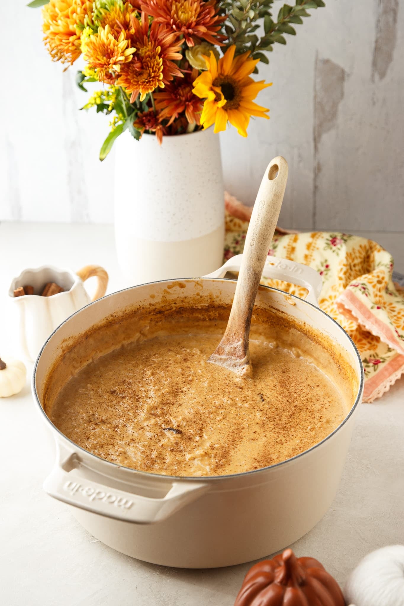 Creamy pumpkin rice pudding inspired by Brazilian arroz doce, made with condensed, evaporated and whole milk plus cinnamon and warm fall spices.