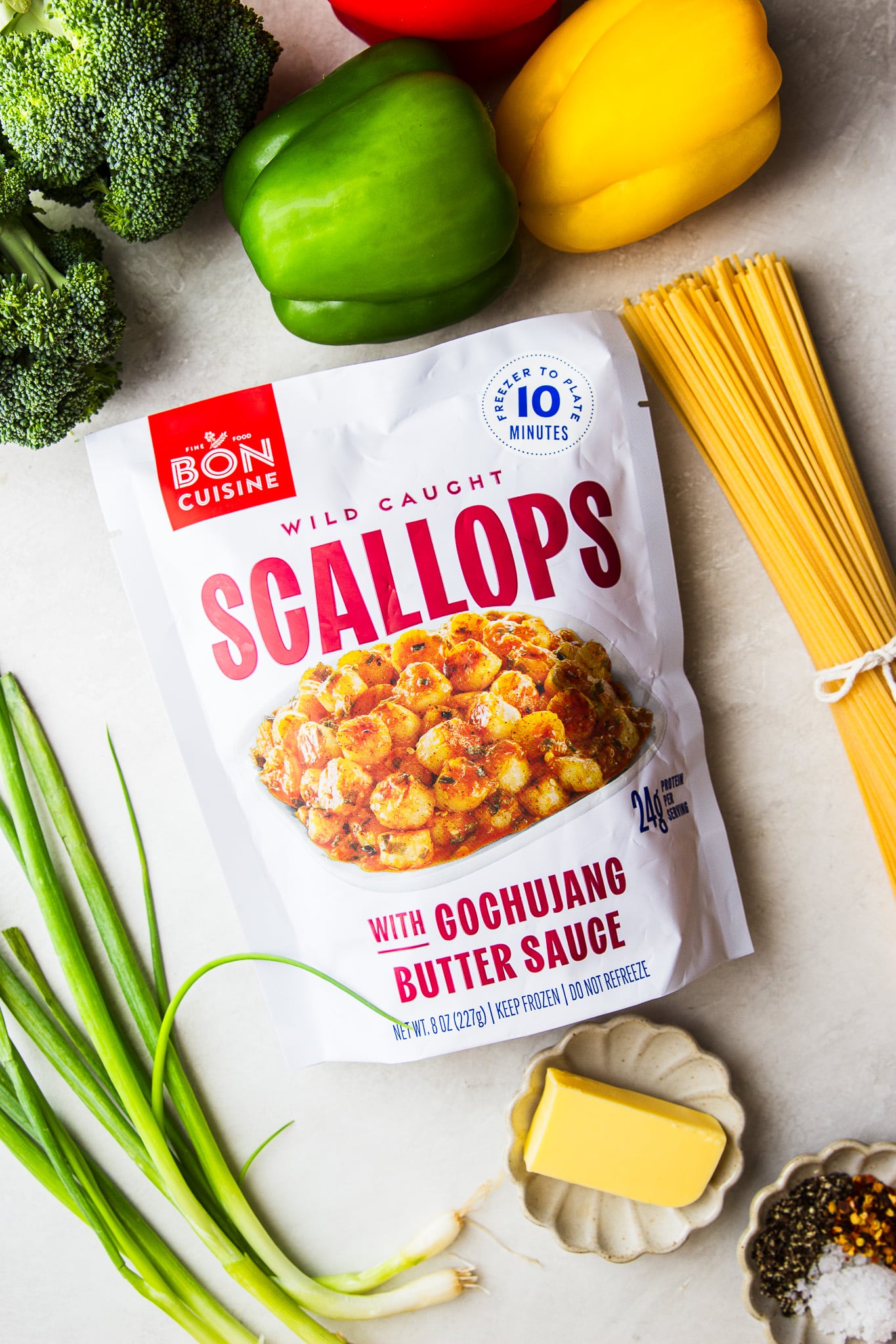 Gochujang scallop pasta combines tender scallops, roasted vegetables and spaghetti in a sweet and spicy butter sauce for an easy 30-minute dinner.