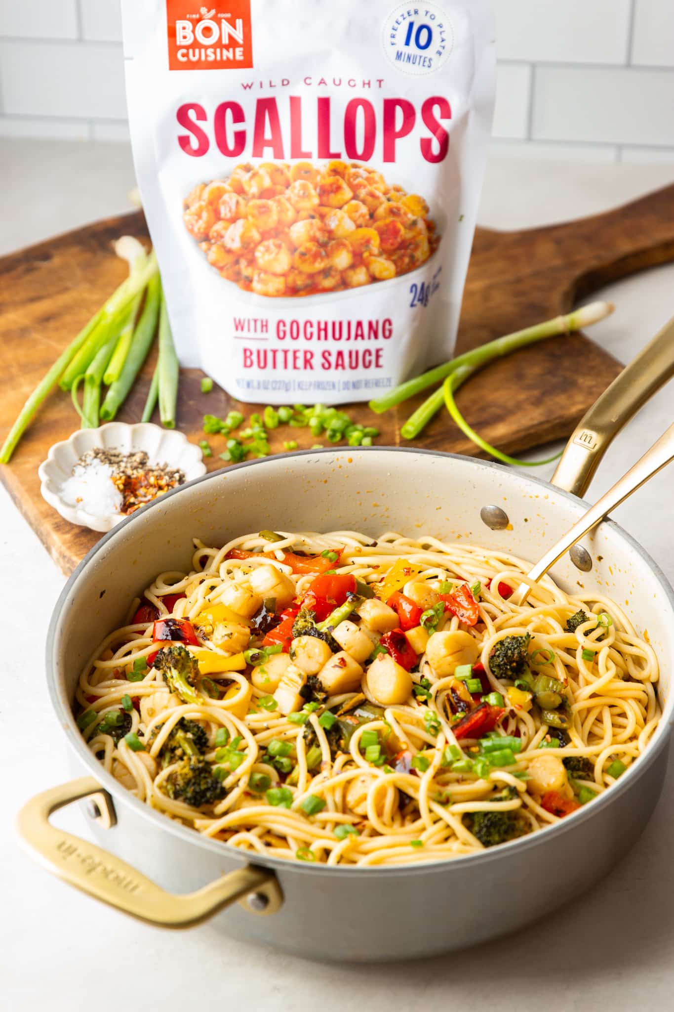 Gochujang scallop pasta combines tender scallops, roasted vegetables and spaghetti in a sweet and spicy butter sauce for an easy 30-minute dinner.